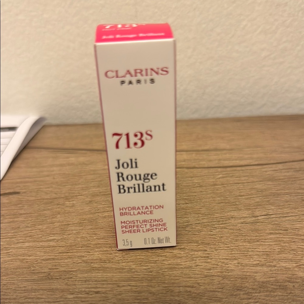 NIB Clarins Joli Rouge Brilliant lipstick.